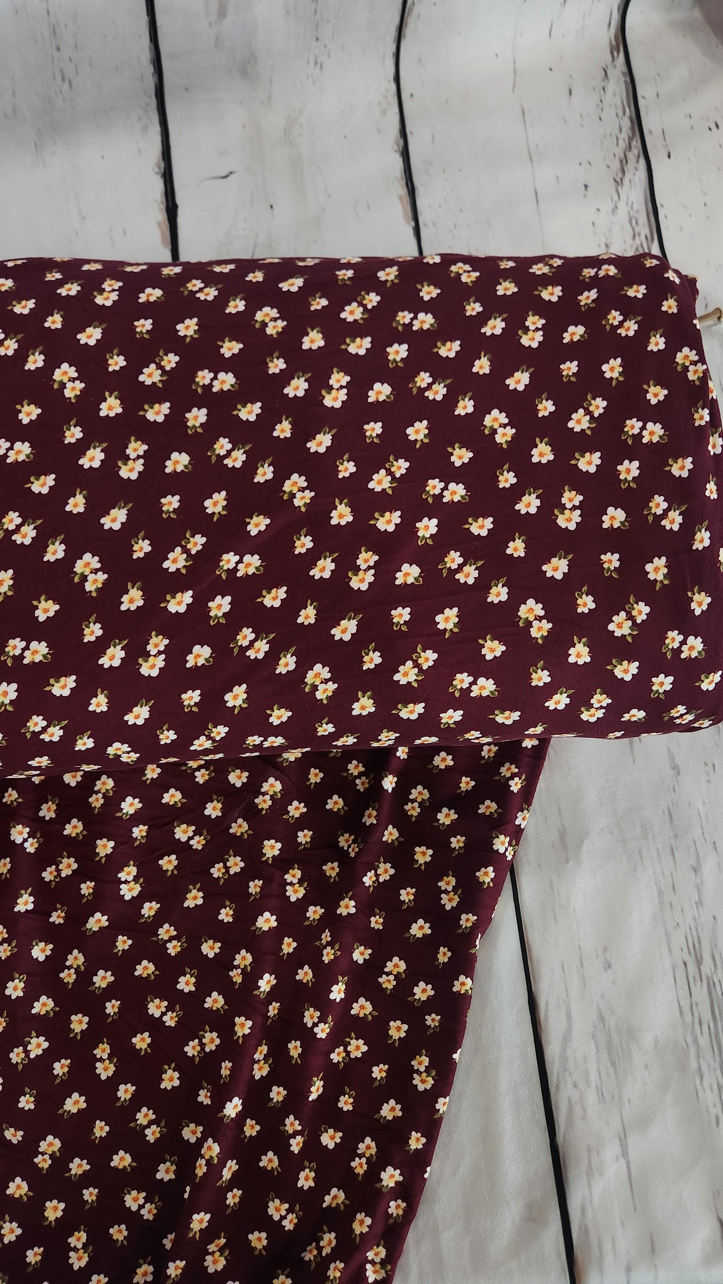 Burgundy with yellow flowers double brush knit